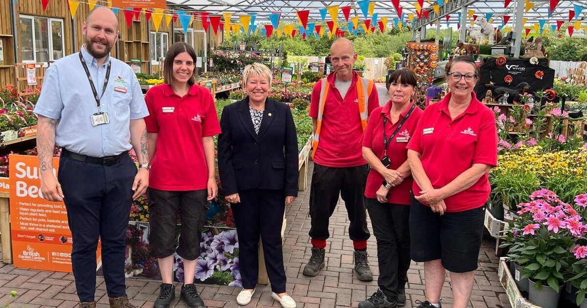 Rachel holds “Cuppa with a Copper” at Newton Regis Garden Centre