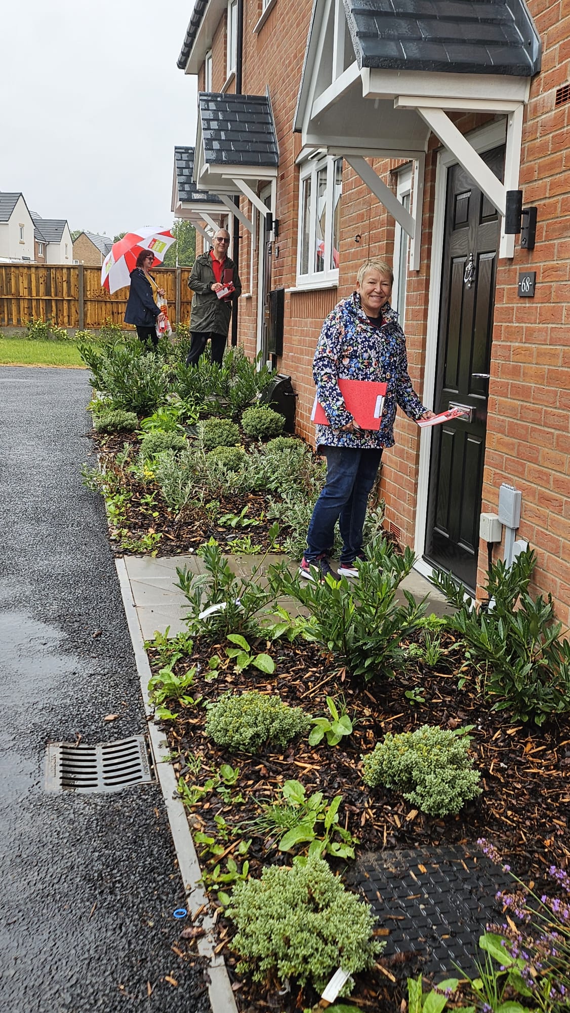 Rachel with Cllr Tim Jenkins and her team talking to residents in Little Bayton View estate