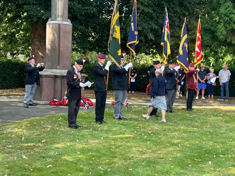 Rachel laying a wreath at the VJ Day memorial service in Bedworth.