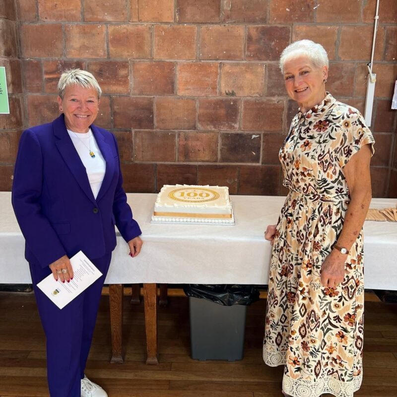 Rachel with Cllr Sue Wallace with the centenary cake