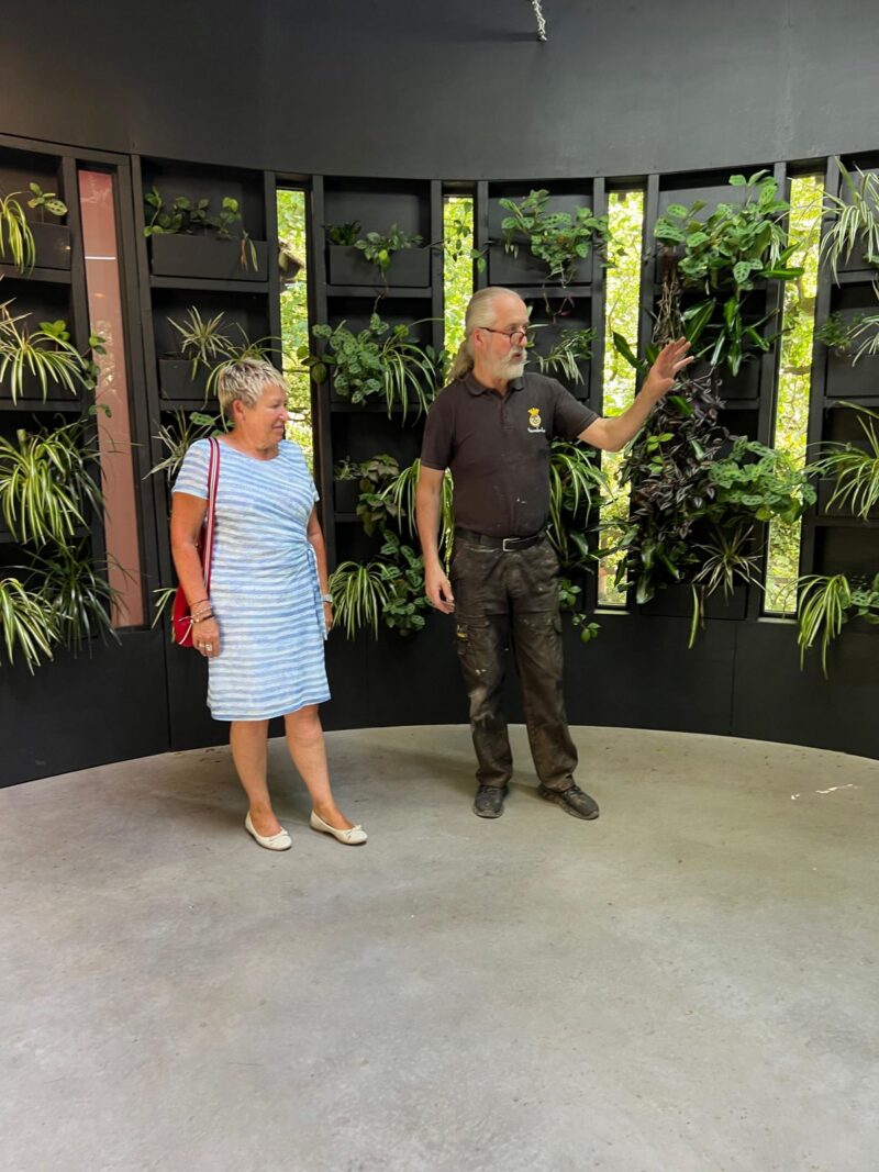 Steve Cuddy showing Rachel inside the "cupcake"